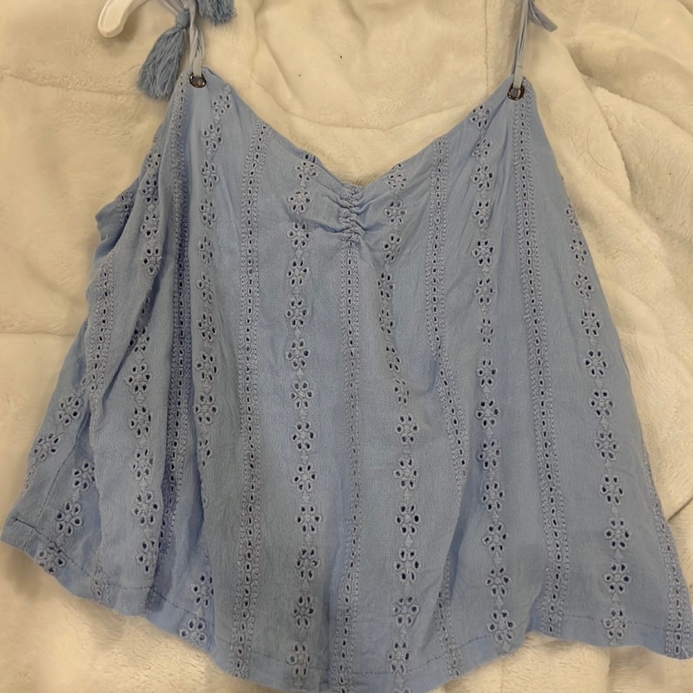 lush brand blue top
